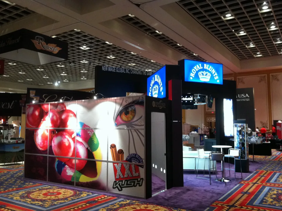 Royal Blunts exhibit with a large cherry graphic wall
